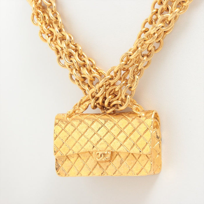 Chanel
Gold Metal Quilted Flap Bag Multi-Chain Necklace